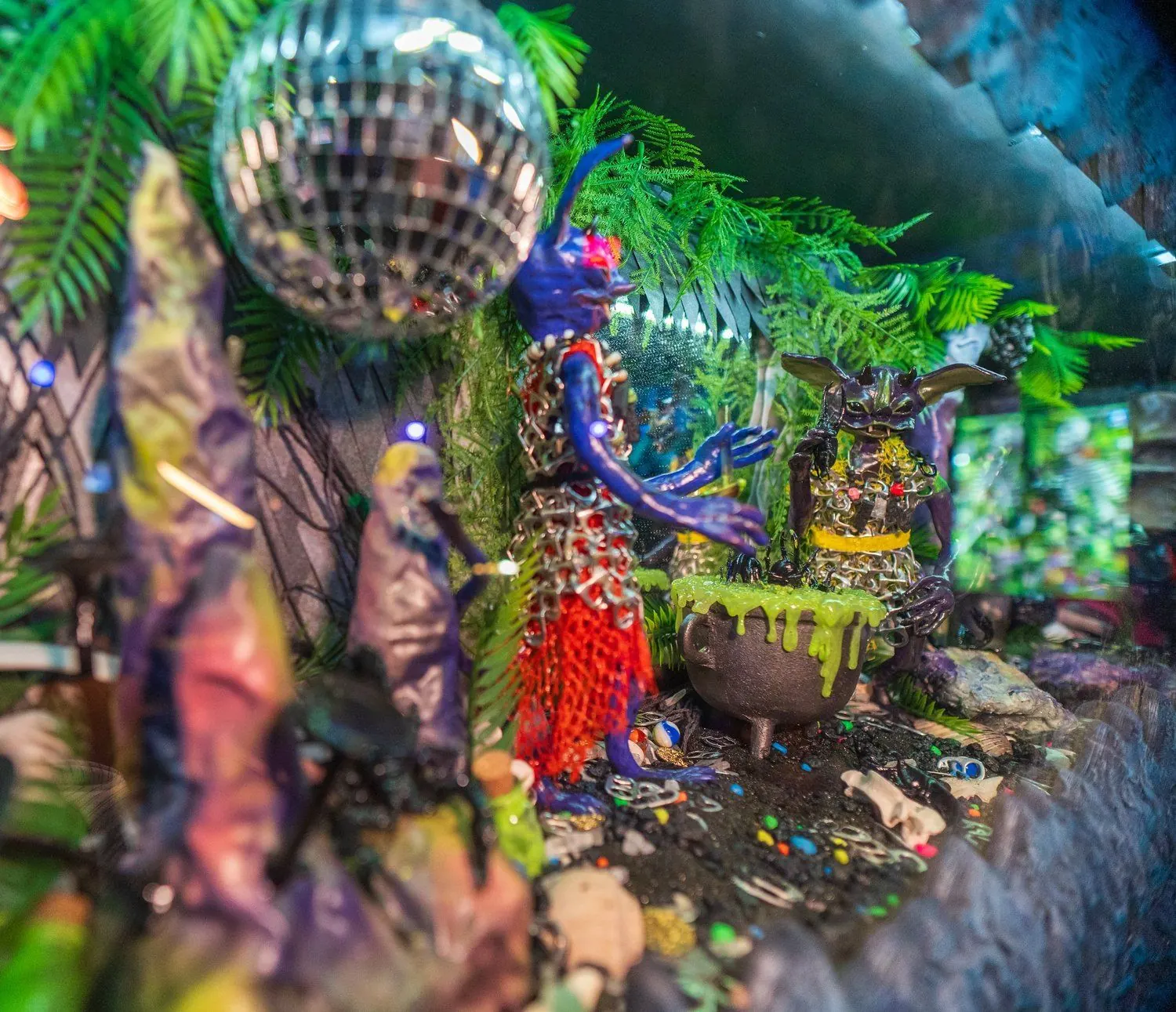 A mirror ball over the jungle walls at Endless Bummer