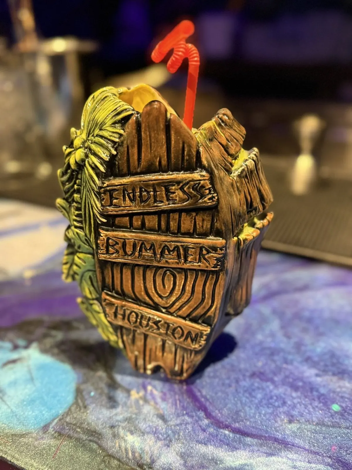 Two Endless Bummer coffin tiki mugs on the bar